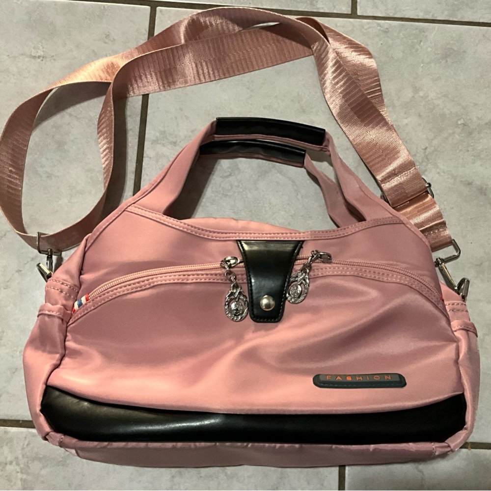 Pink Crossbody Bag with Adjustable Strap and Durable Material